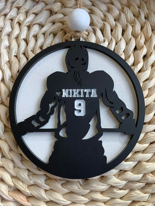 Hockey player ornament