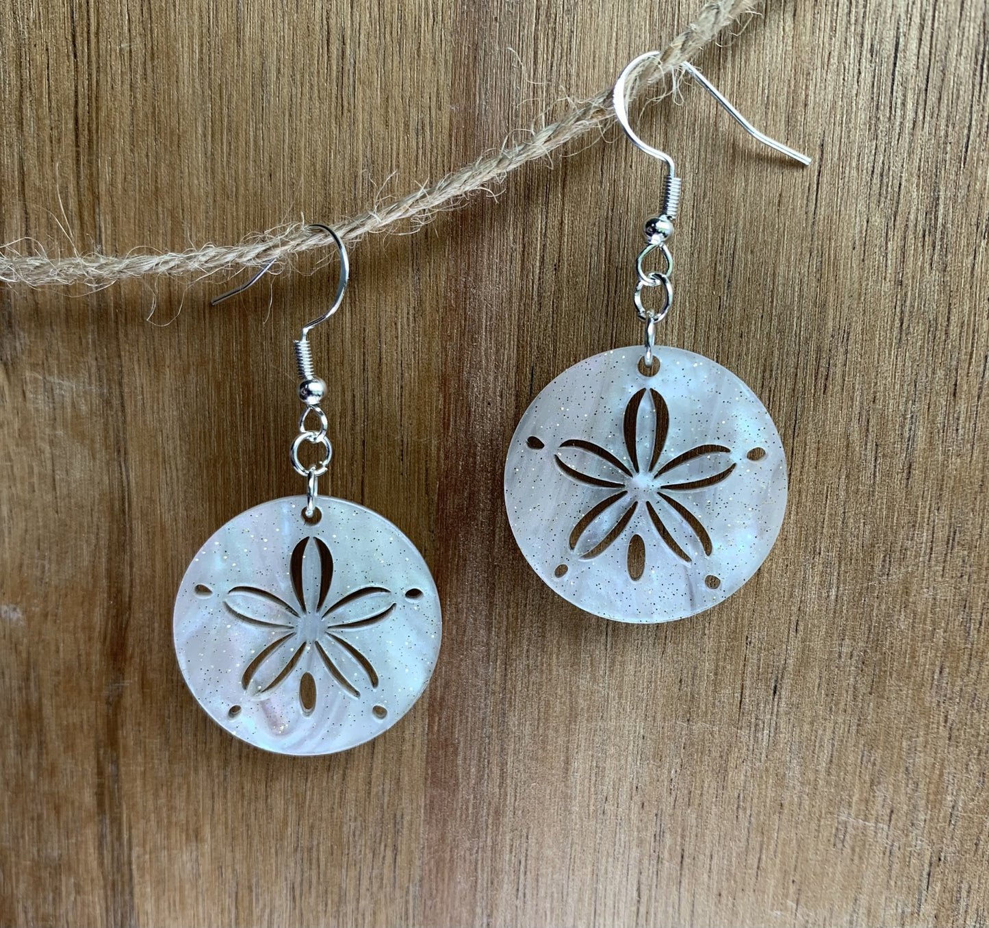 Earrings, sand dollar